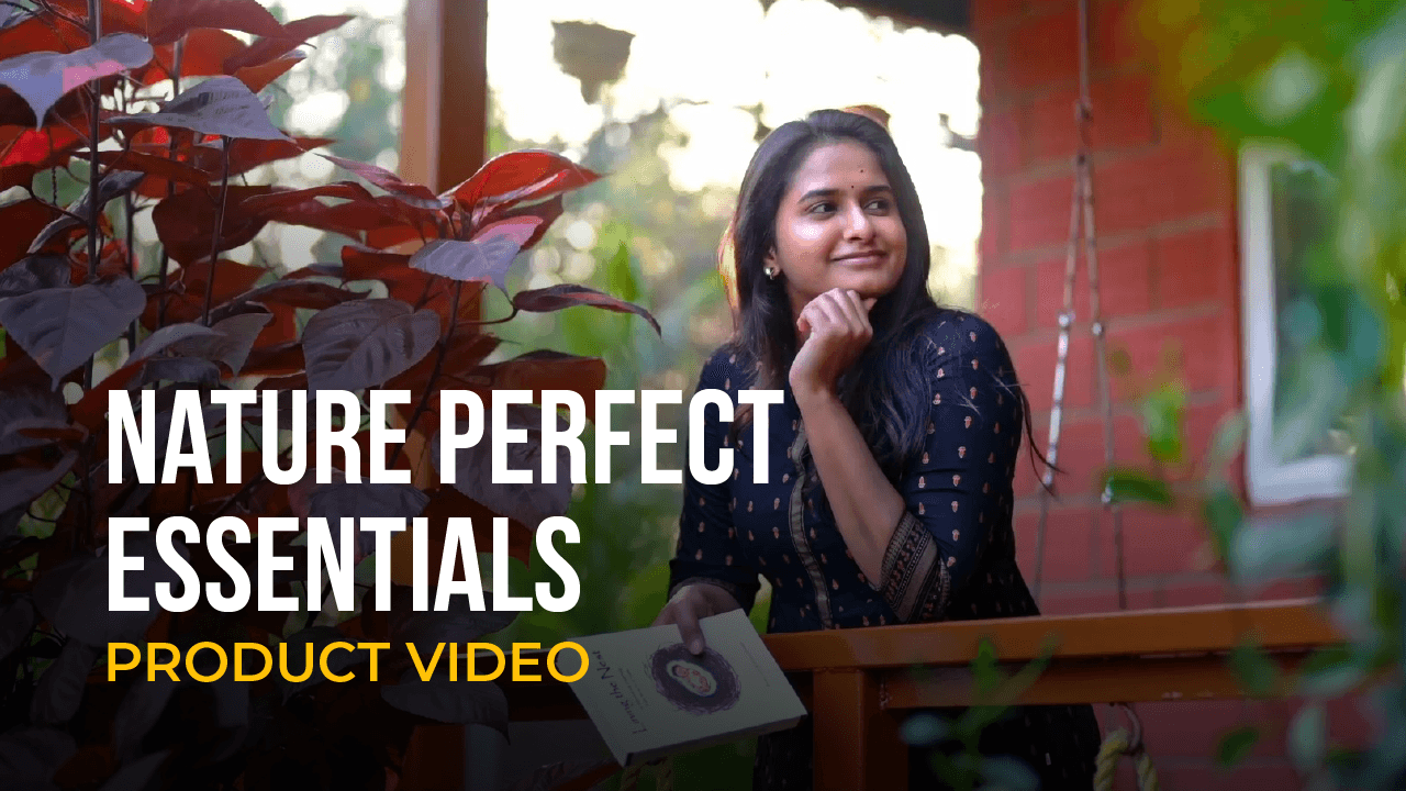 Nature Perfect Essentials product video featuring a woman sitting in a garden surrounded by plants.