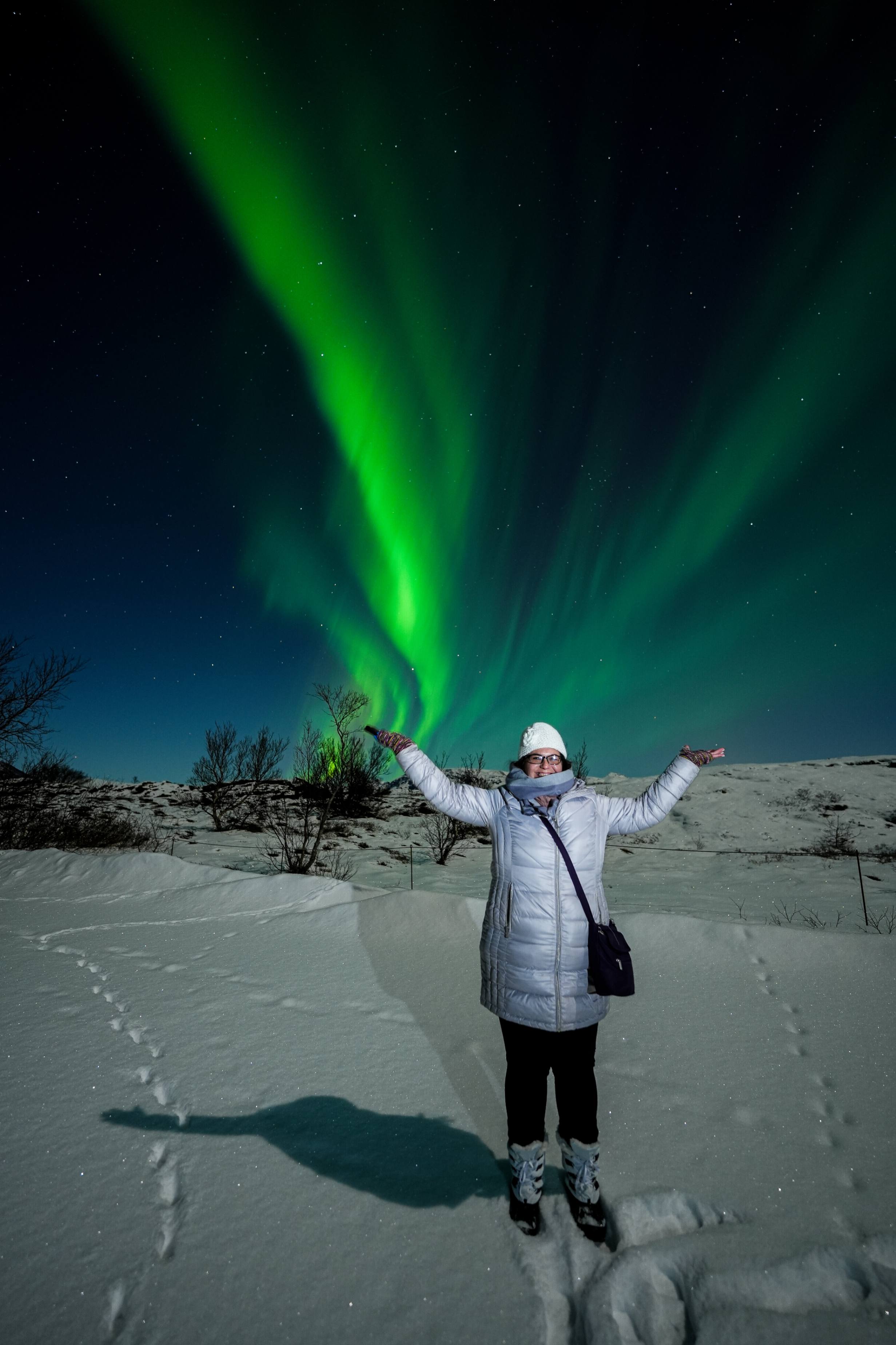 Northern Lights tour photography from Aurora Experts in Iceland, featuring guests beneath the aurora, winter landscapes, and vivid skies over remote Icelandic locations.