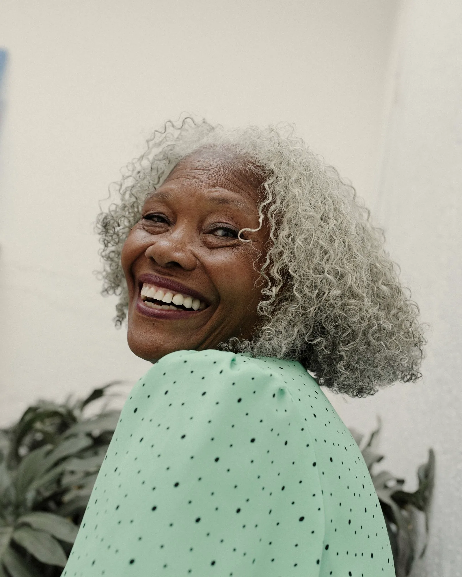 Portrait of Gloria, smiling