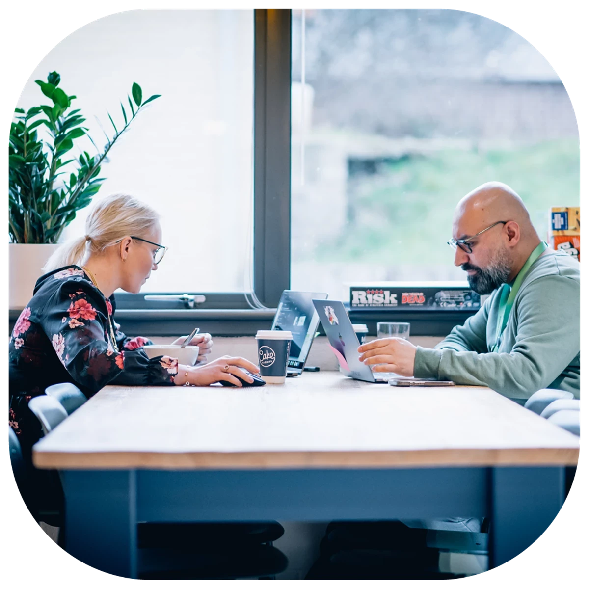 Two Opencast team members working together in the Newcastle office