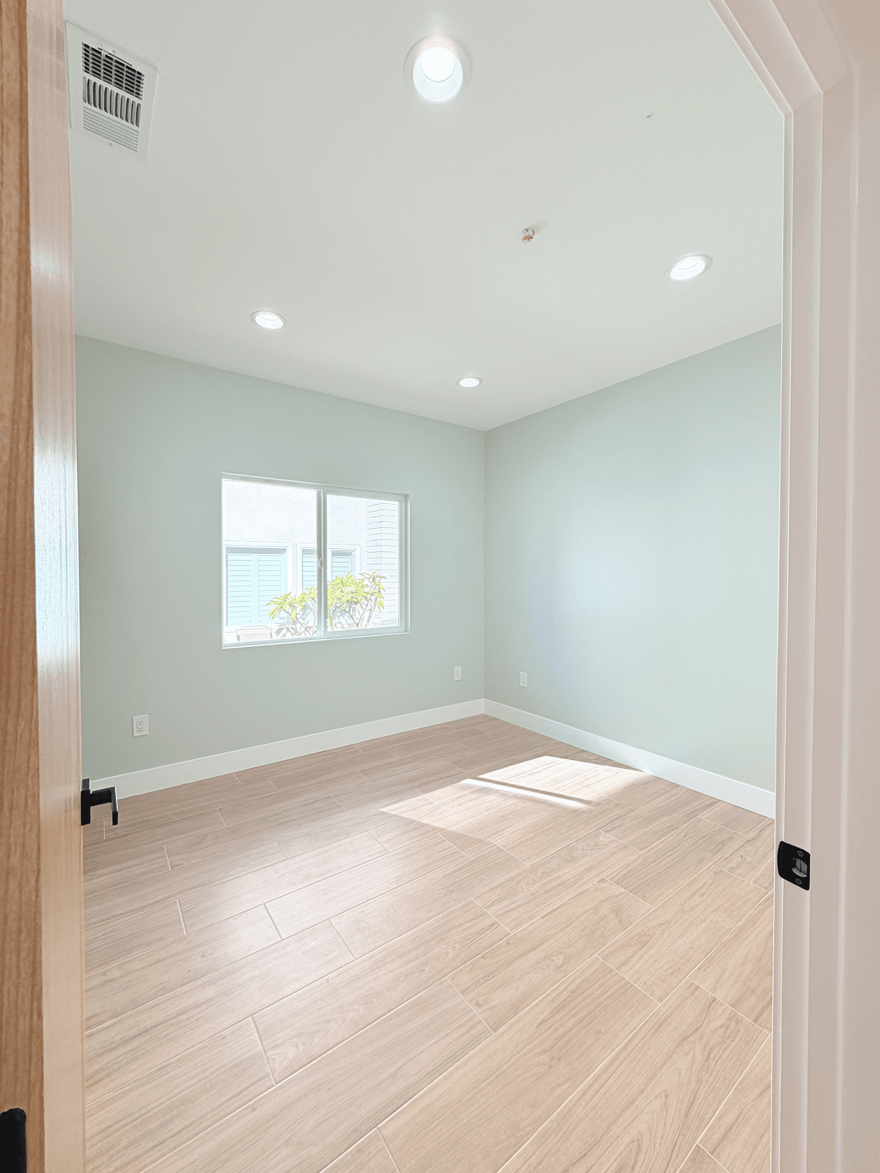 Spacious ADU interior with natural lighting and modern flooring