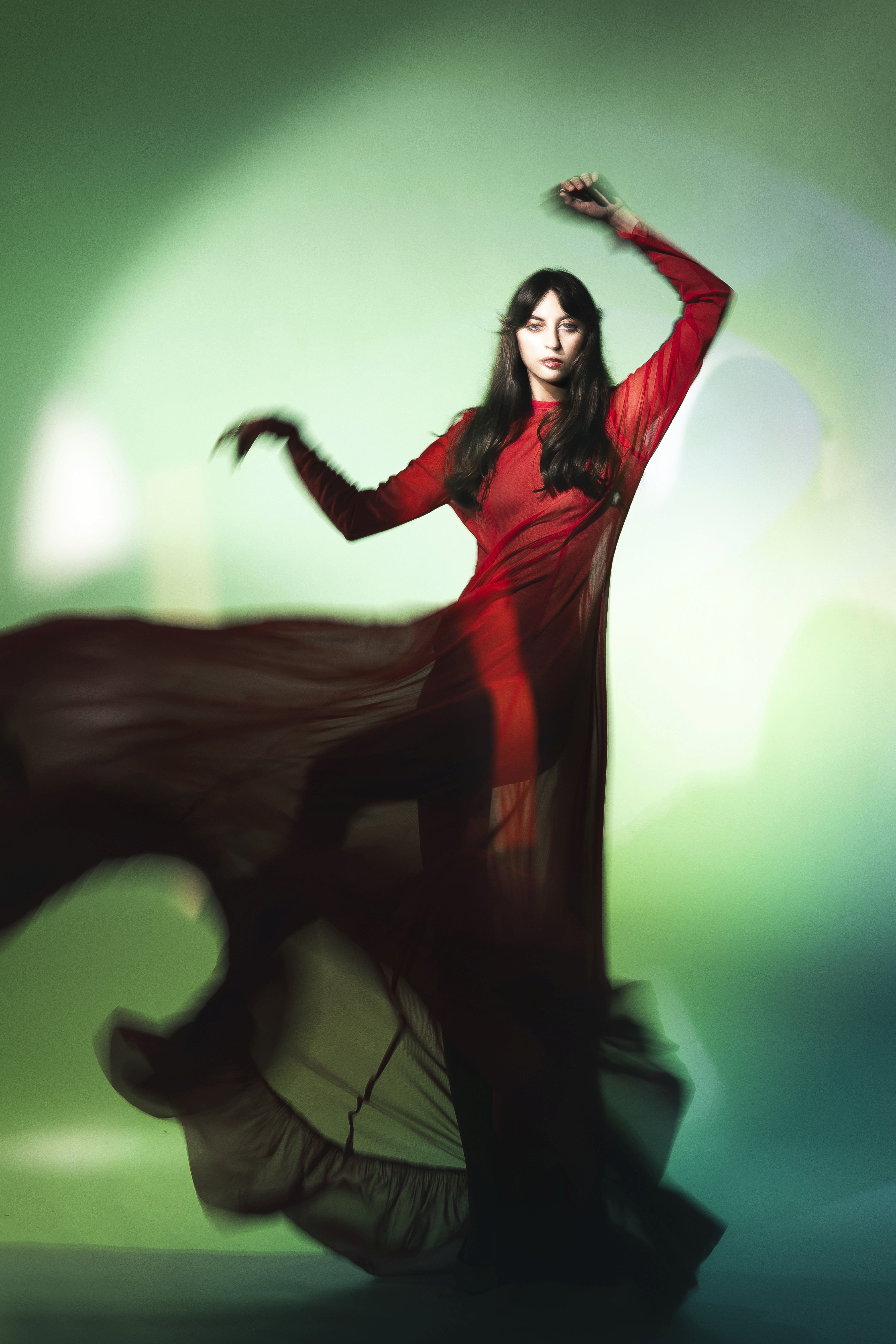 Beautiful girl holding her hair above her head