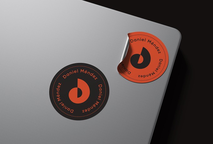 Interior view from living area toward the lake, large glass facade, minimal furniture.