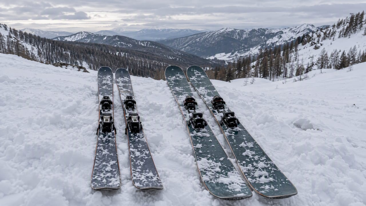 Pair of skis resting on snow