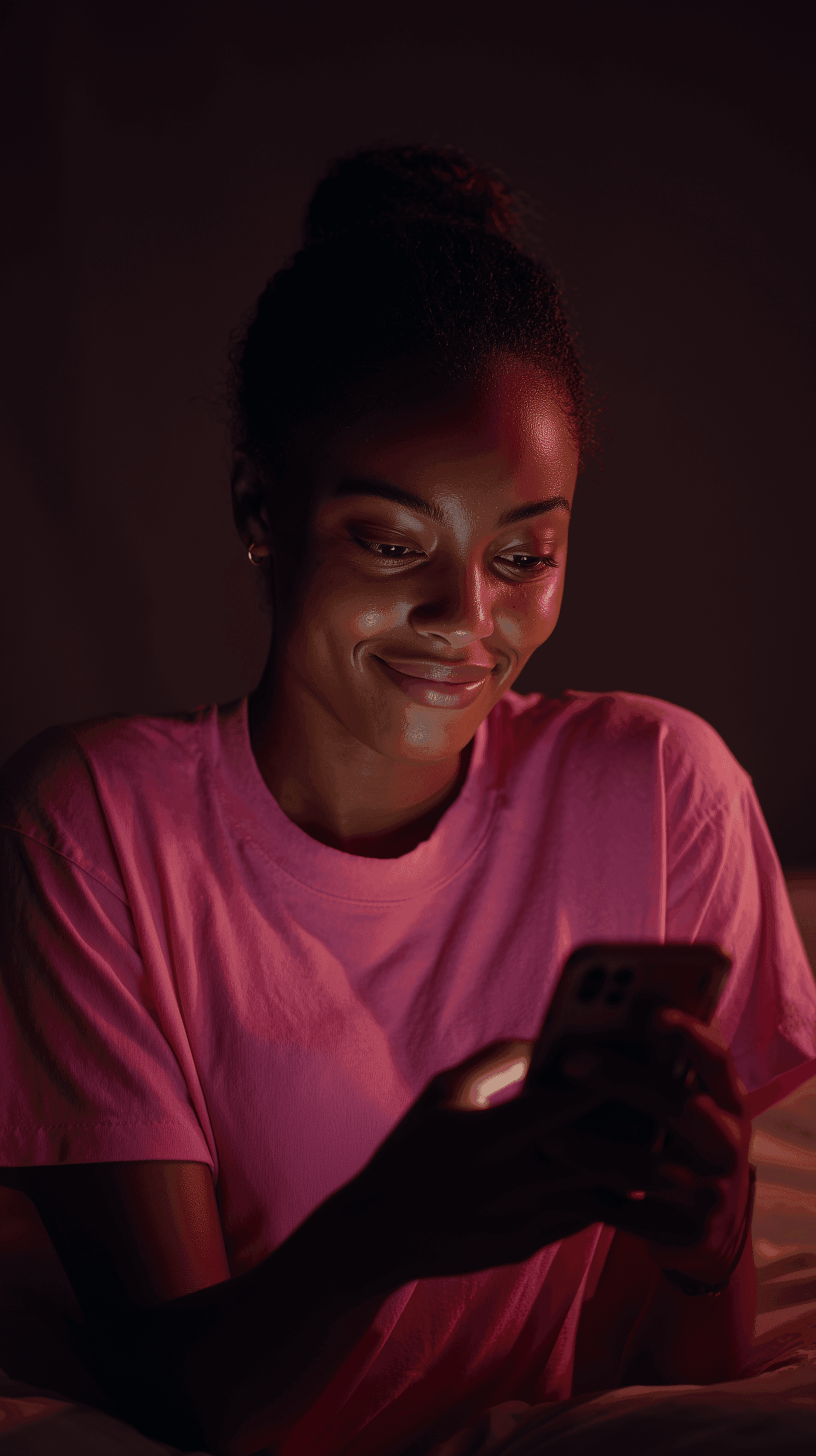 two people looking at a tablet and smiling