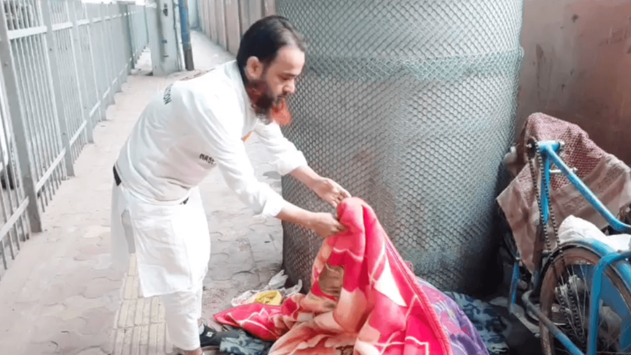 a group of children sitting on steps in front of a building