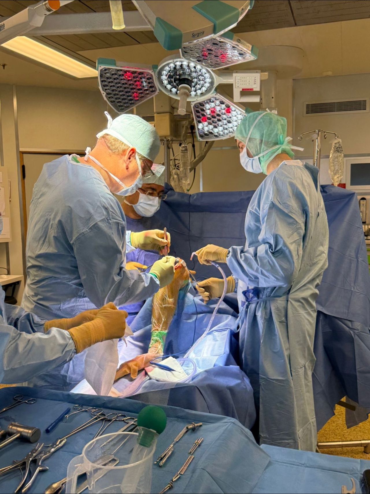 A person wearing a virtual reality headset in a desert landscape bathed in orange light