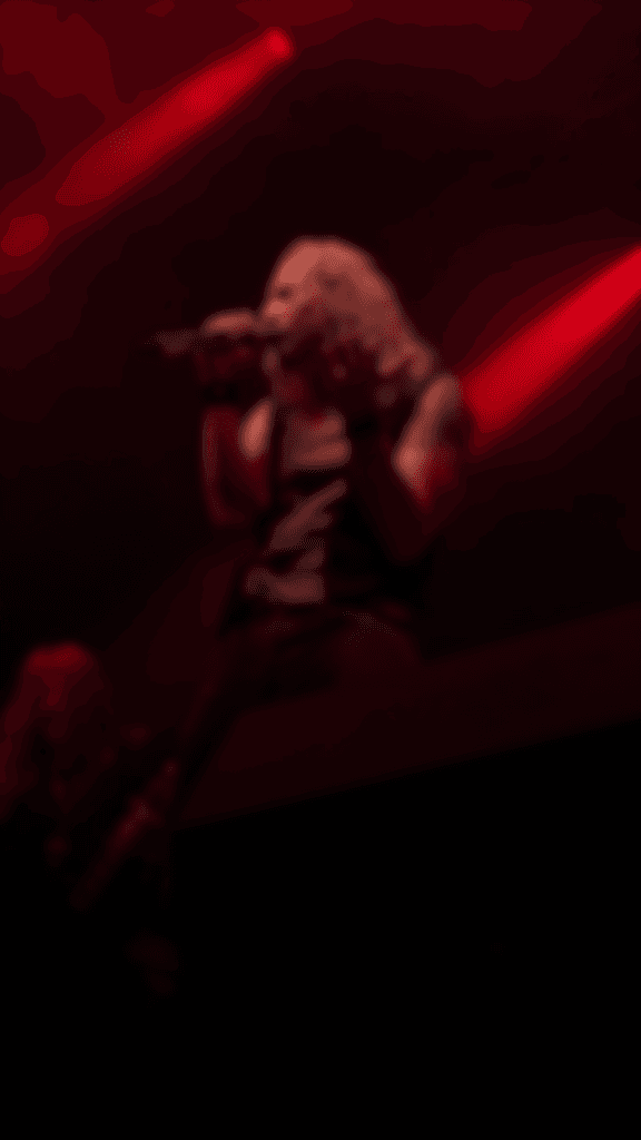 Picture of a singer, standing for "Behind-the-Scenes"