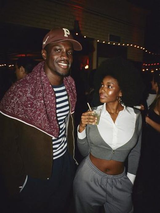Two friends at an outdoor party