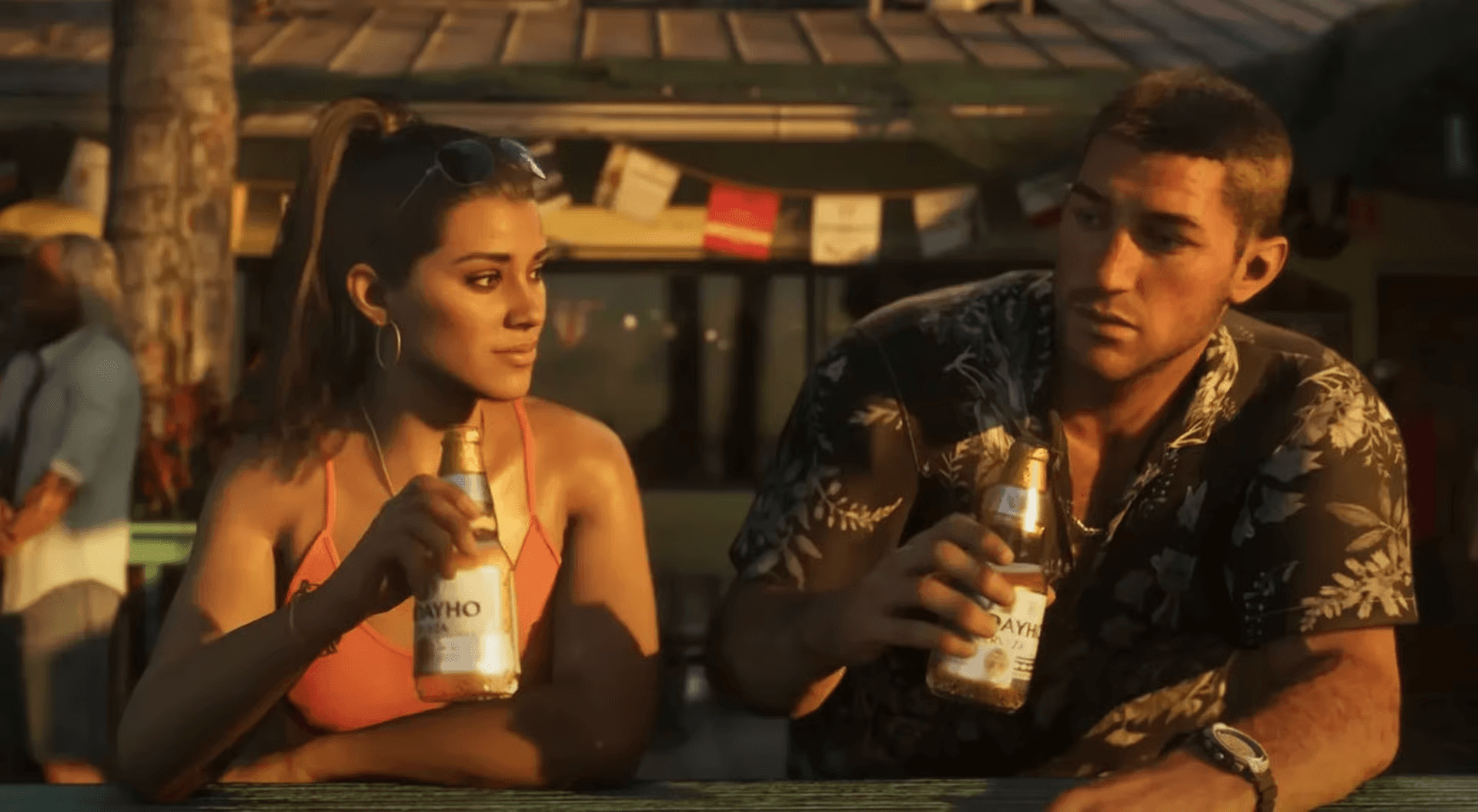 Two animated characters sit outdoors at a tropical bar, each holding a bottle of beer, with colorful flags hanging in the background and a warm, golden sunset casting a cozy glow.