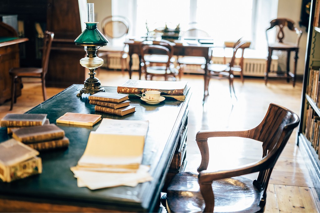 Three horses galloping across fresh snow, symbolising unity, strength, and purposeful motion across generations.