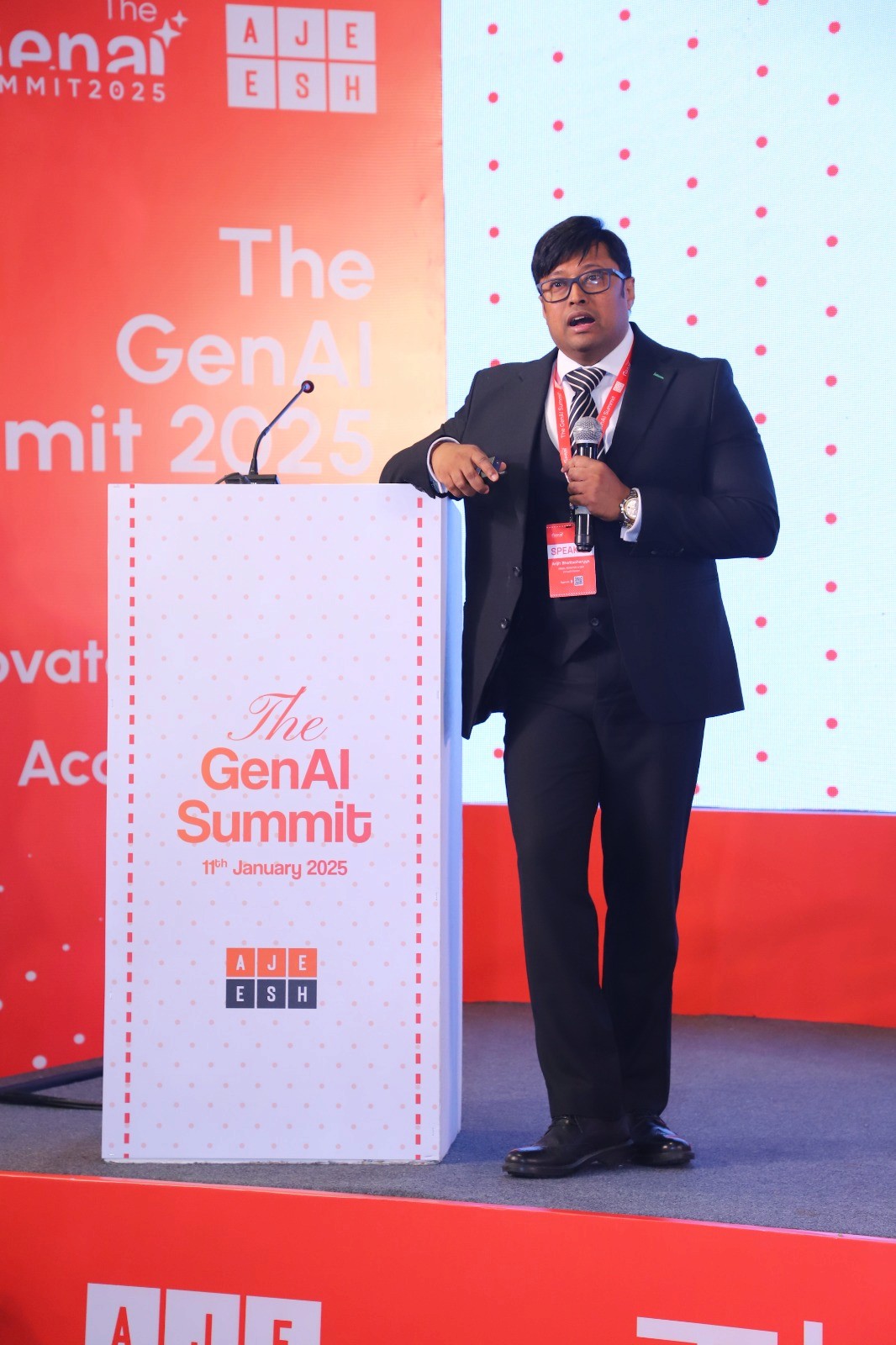 A Man Talking using Microphone in the Conference Room