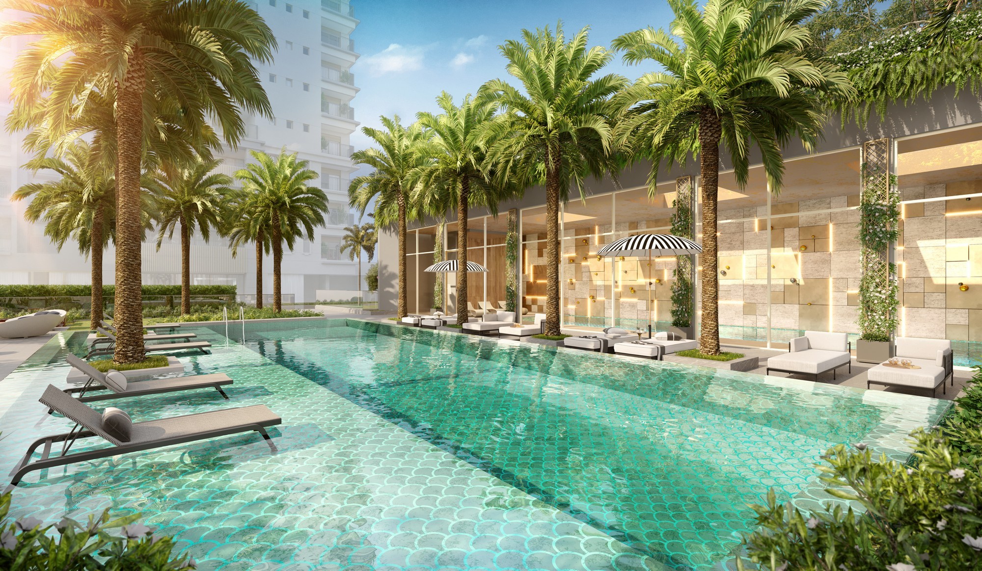 Curved modern skyscraper against a clear blue sky.