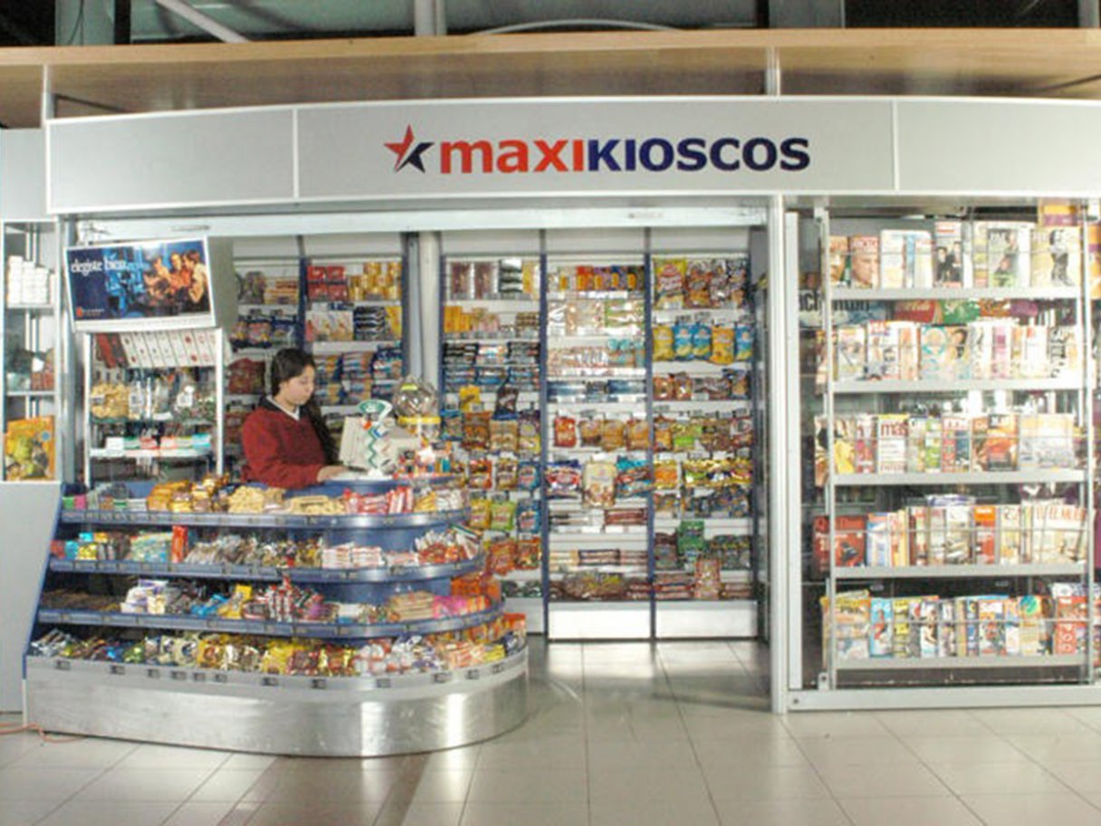 Rooftops of a coastal town with the sea in background