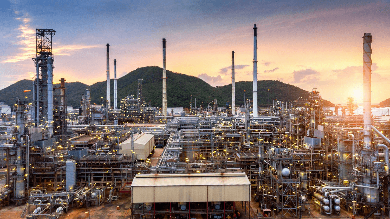 red hard hat on pavement\