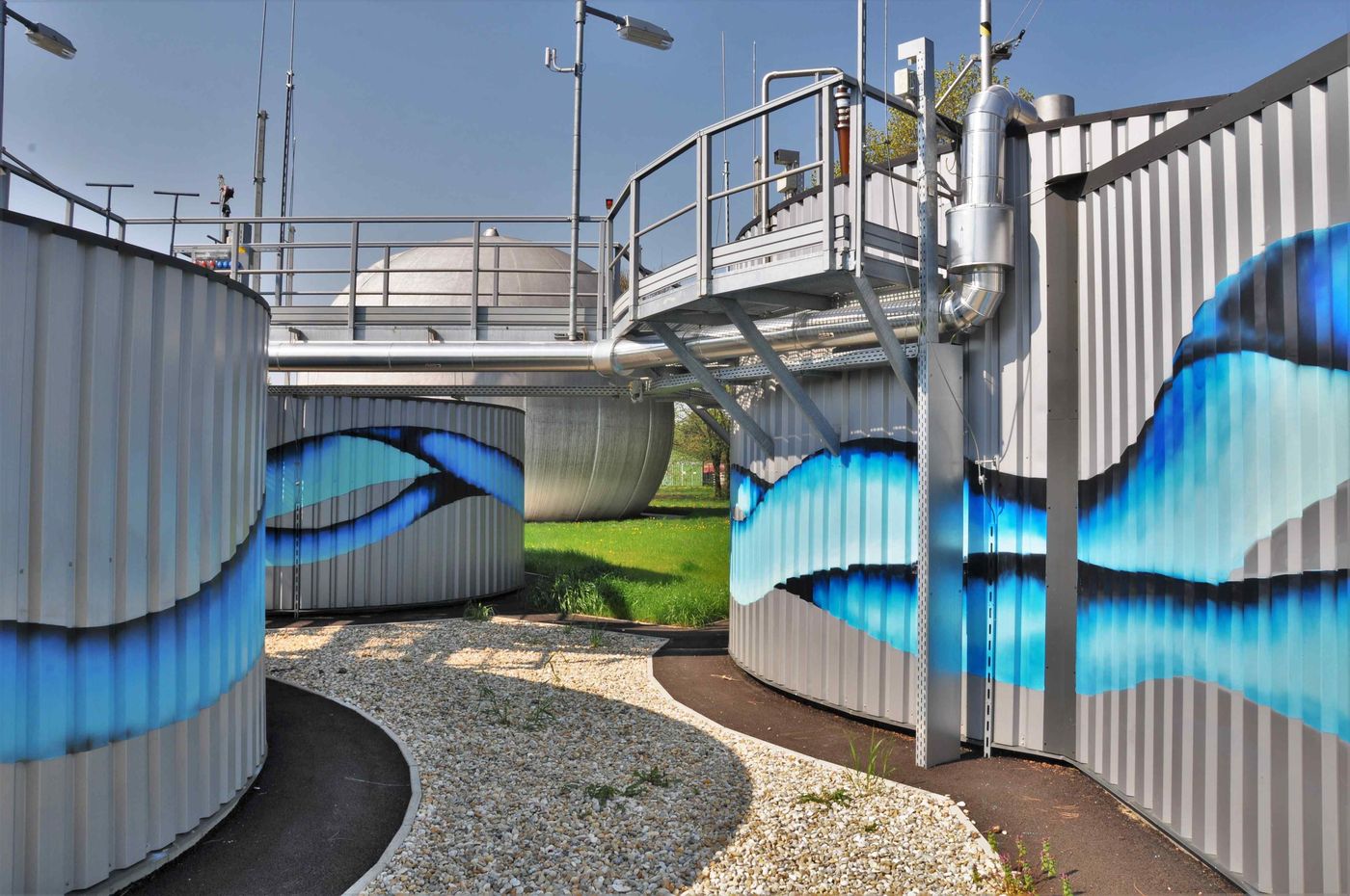 Painted process tanks and walkways at the Zalaegerszeg regional wastewater treatment plant, Hungary
