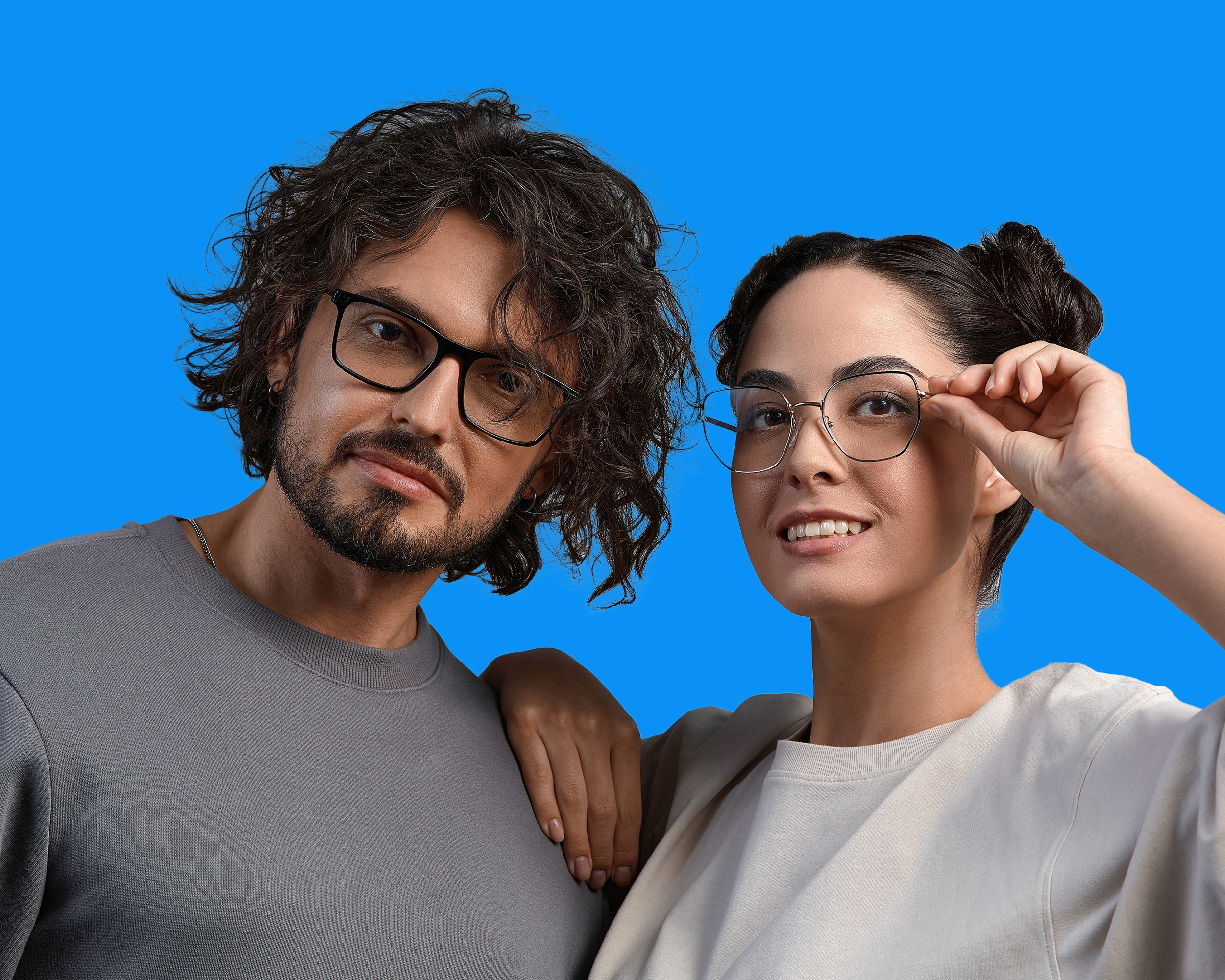 two persons wearing glasses