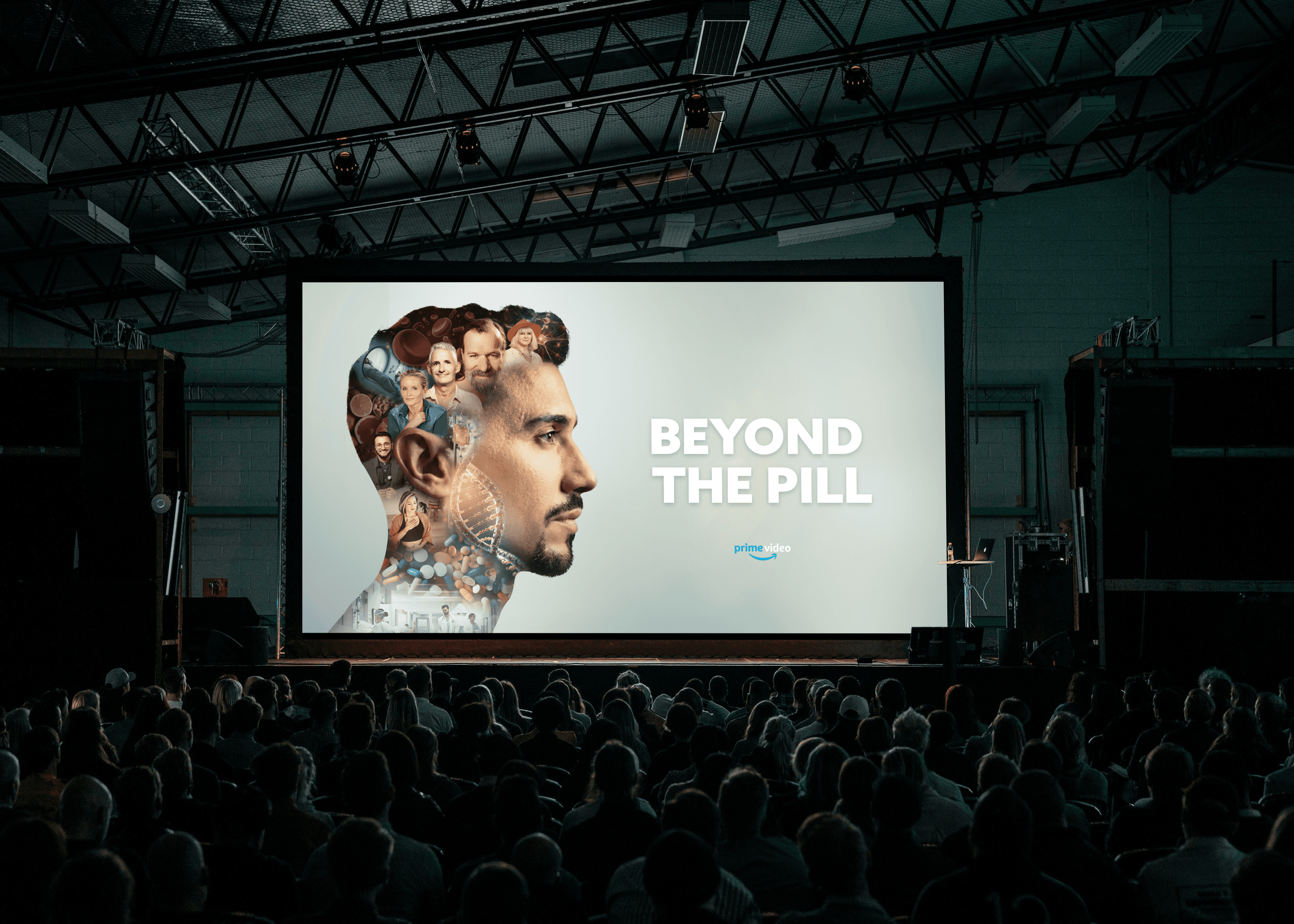 Person sitting in a modern office in front of a wall covered with notes and sketches.