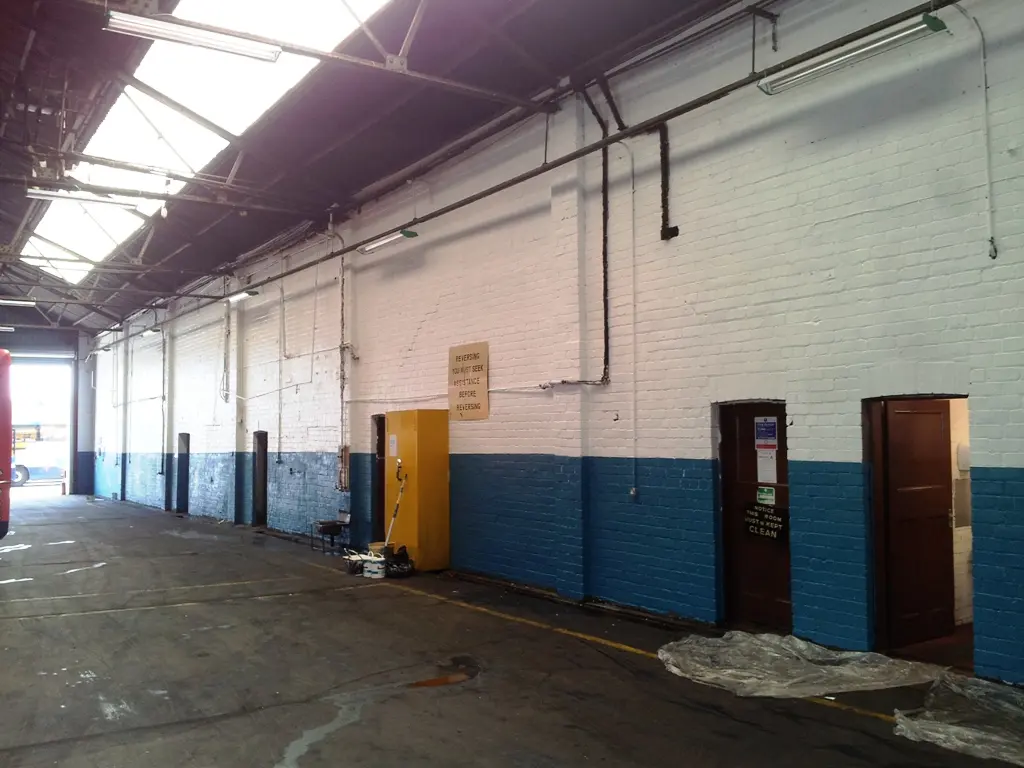 Inside an industrial looking brick building