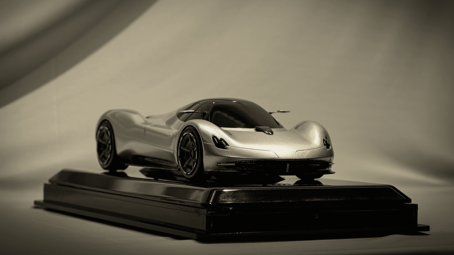 A hero image of Pagani Alisea 1:12 scaled sculpture from a photoshoot.