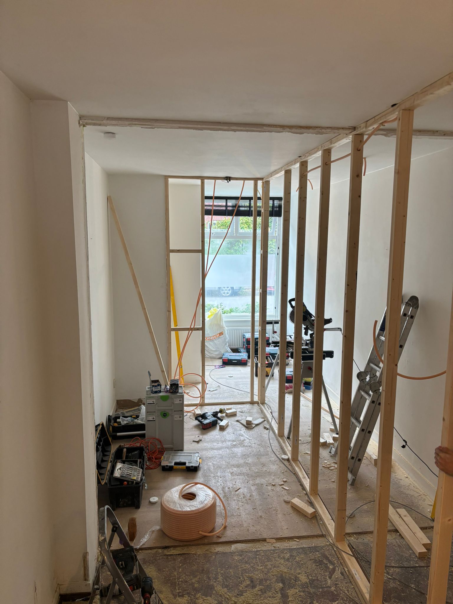 husband and wife working happily on a laptop