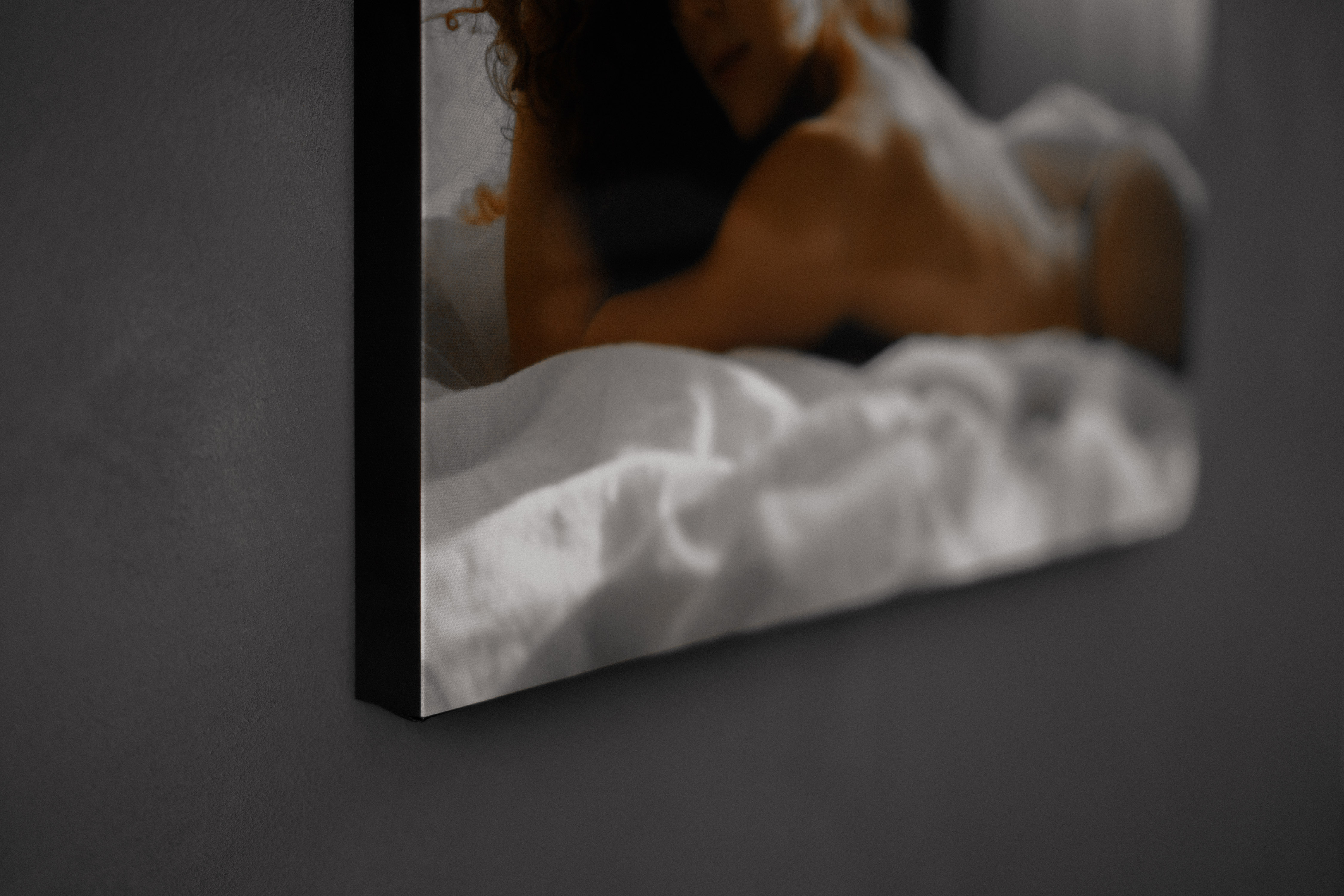 Canvas art of a sensual boudoir experience, showcasing luxury photography.