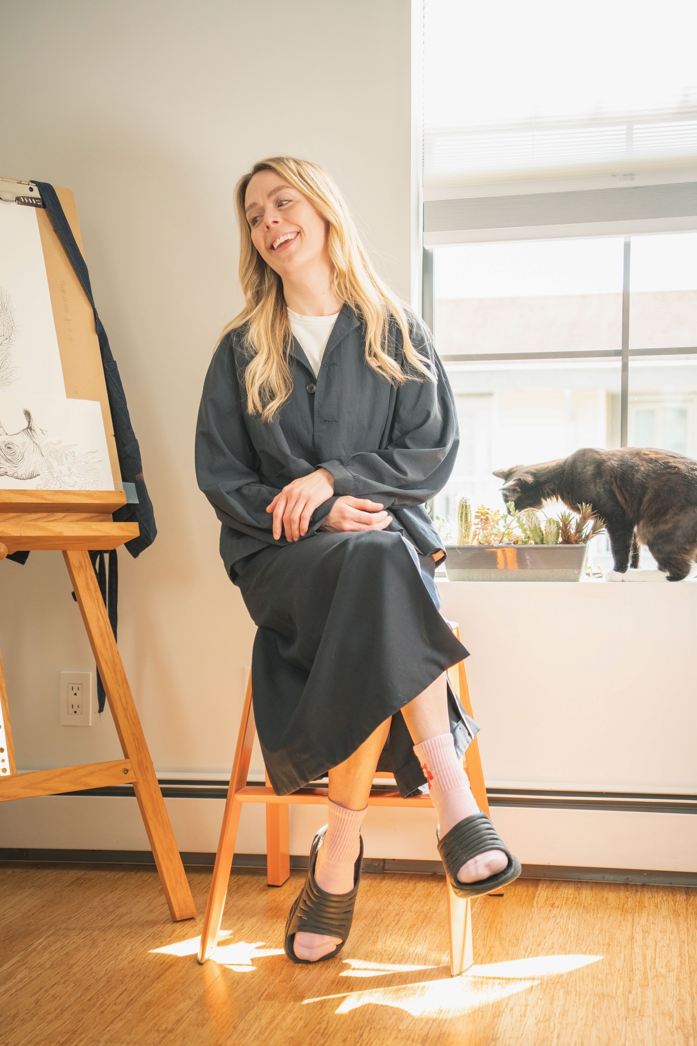 me drawing driftwood in my studio