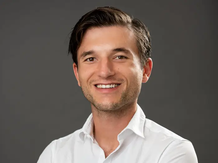a woman with an afro is looking at the camera