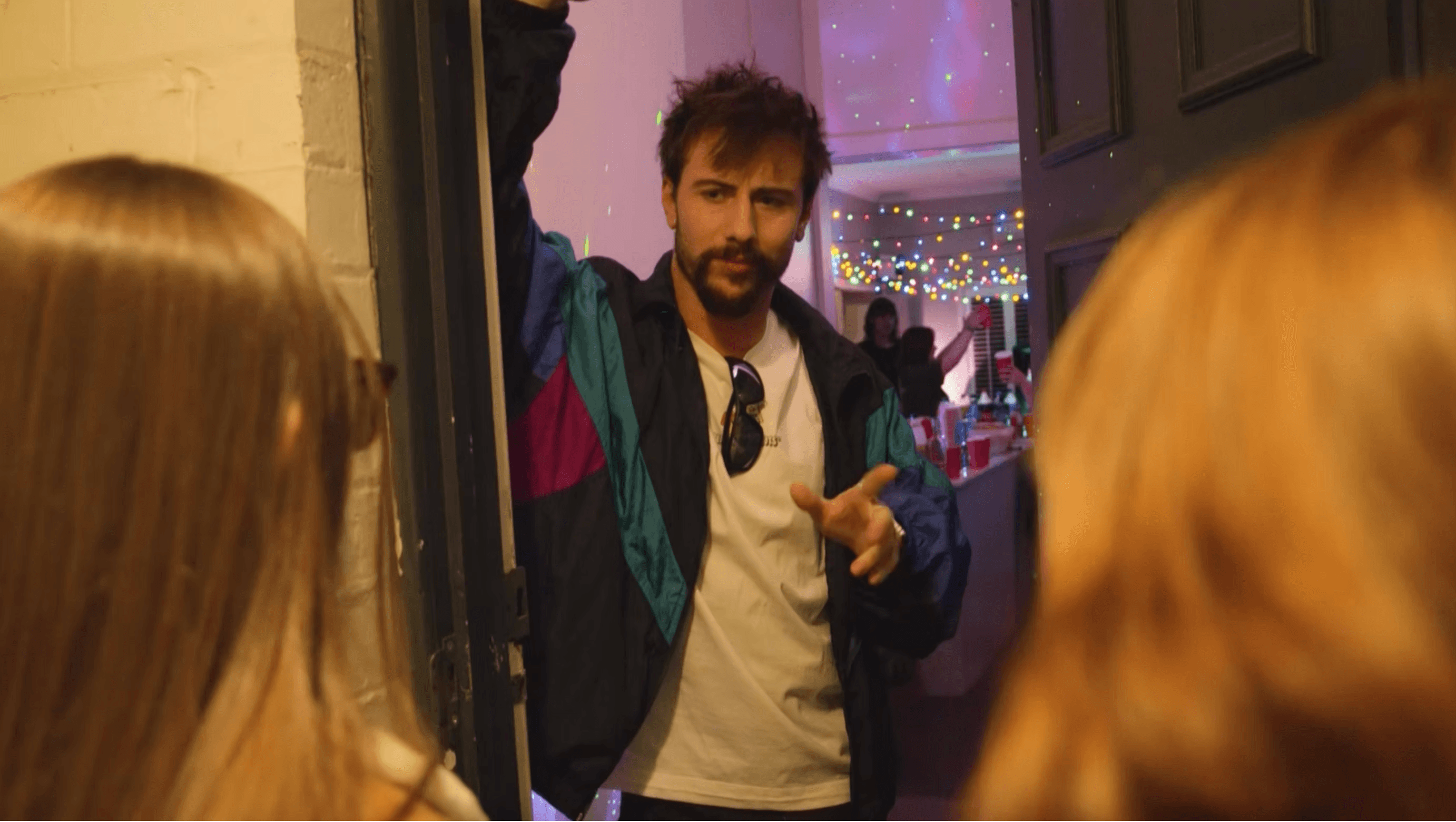 Trix, The Aviatrix surrounded by cloud dancers in a makeshift cardboard plane