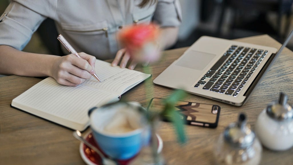 Entrepreneur creating content for their content marketing strategy to increase Shopify traffic and sales