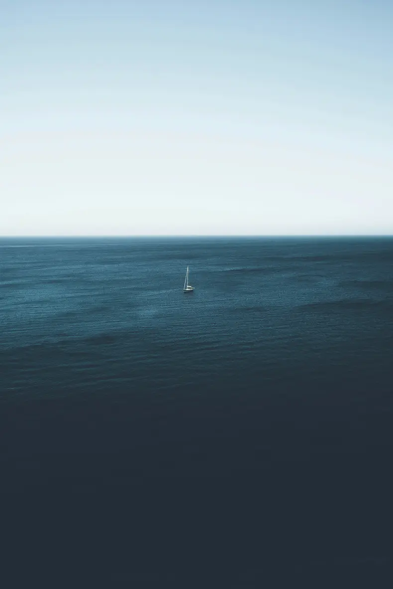 sailboat on body of water during daytime