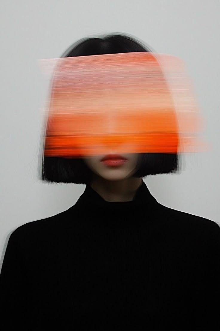 A fast black sports car races down the highway.