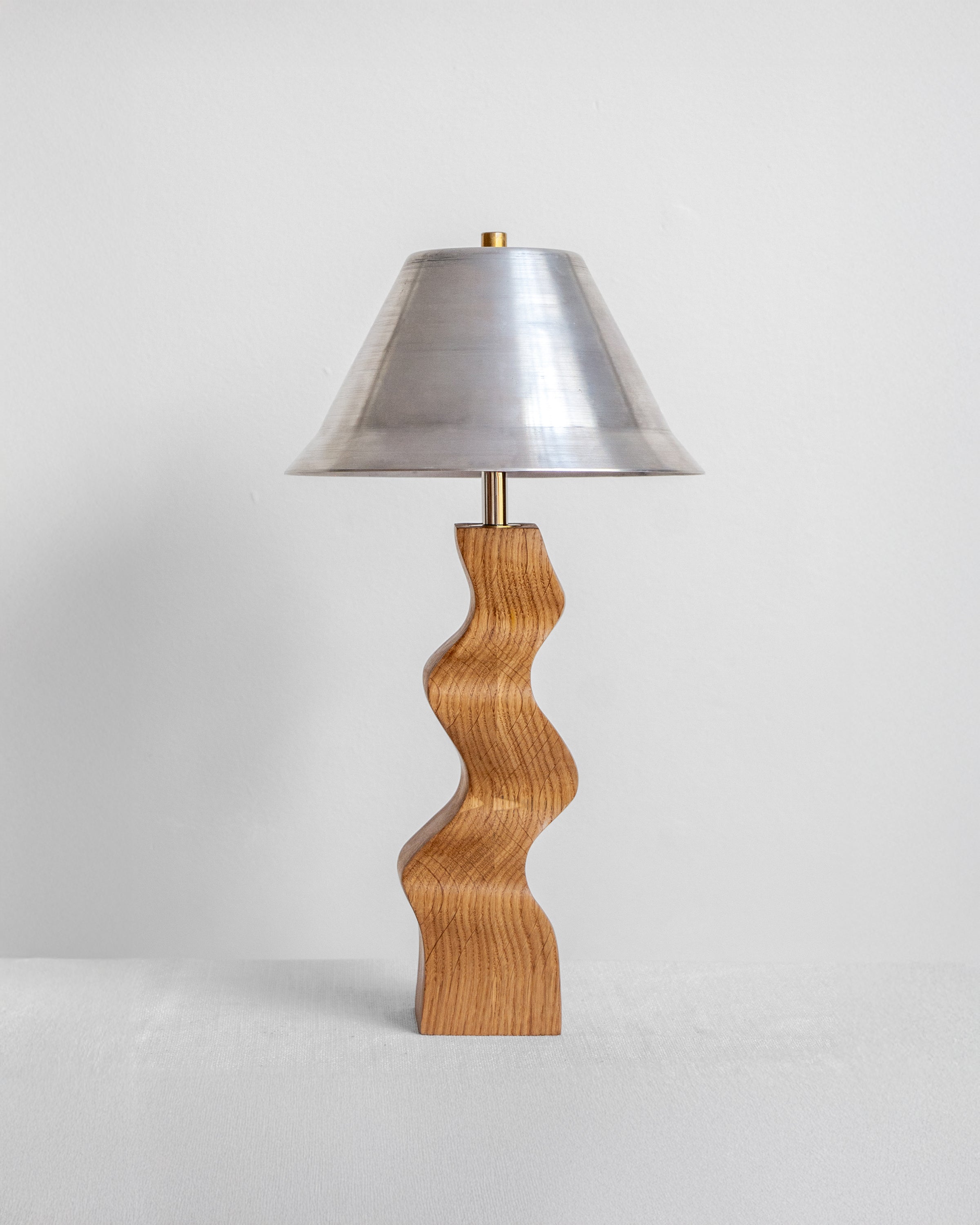 Rippled Desk Lamp in Oak with Aluminium Shade with UK, EU and US/CA wiring available on white background Wilkinson & Rivera