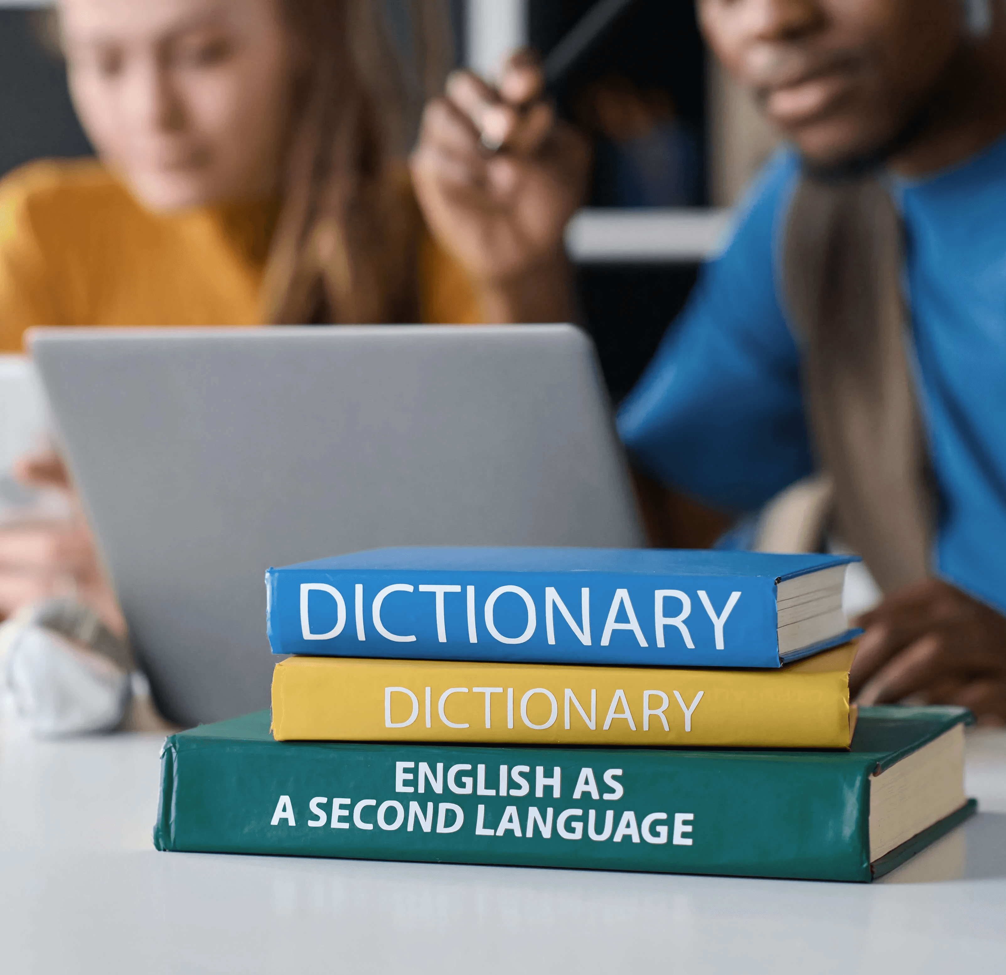 A teacher is explaining a topic, speaking with focus and using gestures to emphasize key points