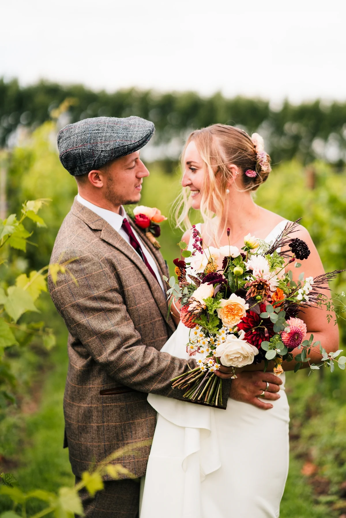 married couple outdoor kissing