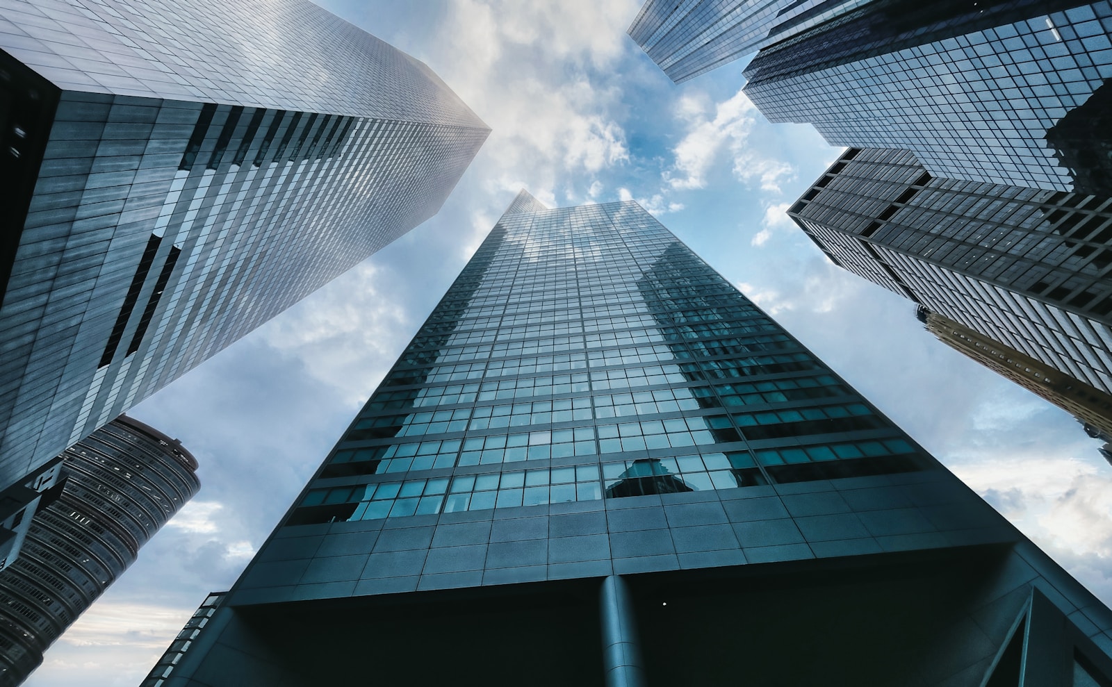 Low angle view of a Manhattan high rise tower against the sky