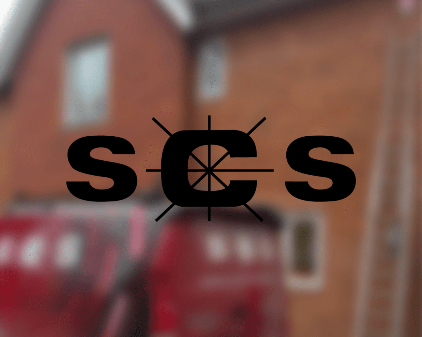 man in orange and black zip up jacket