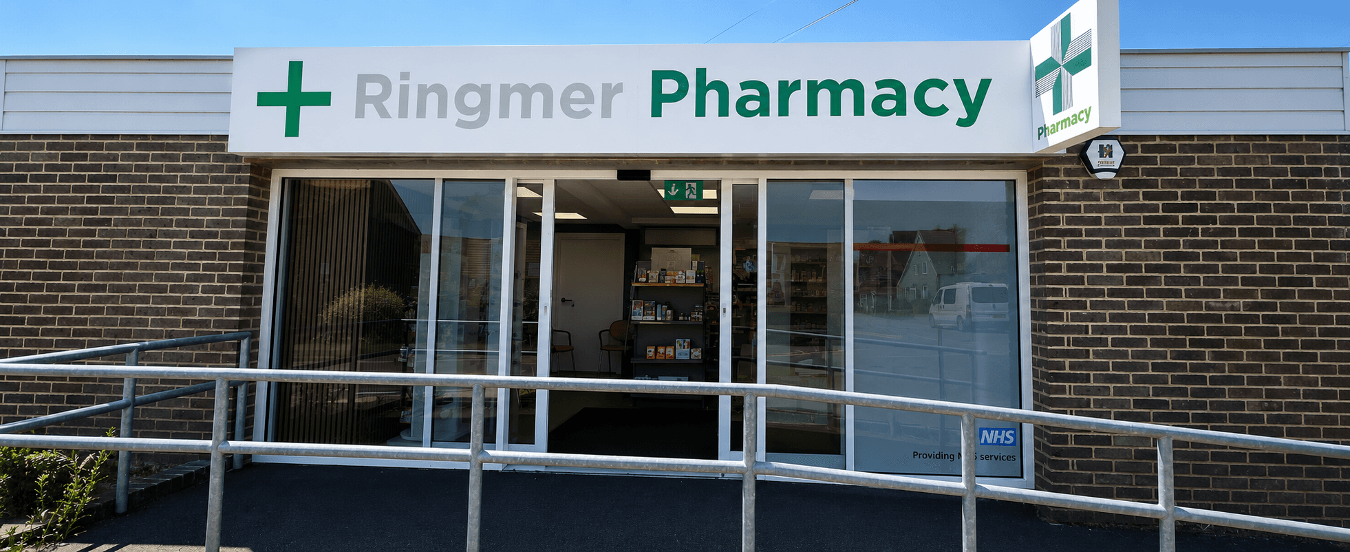 Pharmacist discussing travel vaccines with a patient