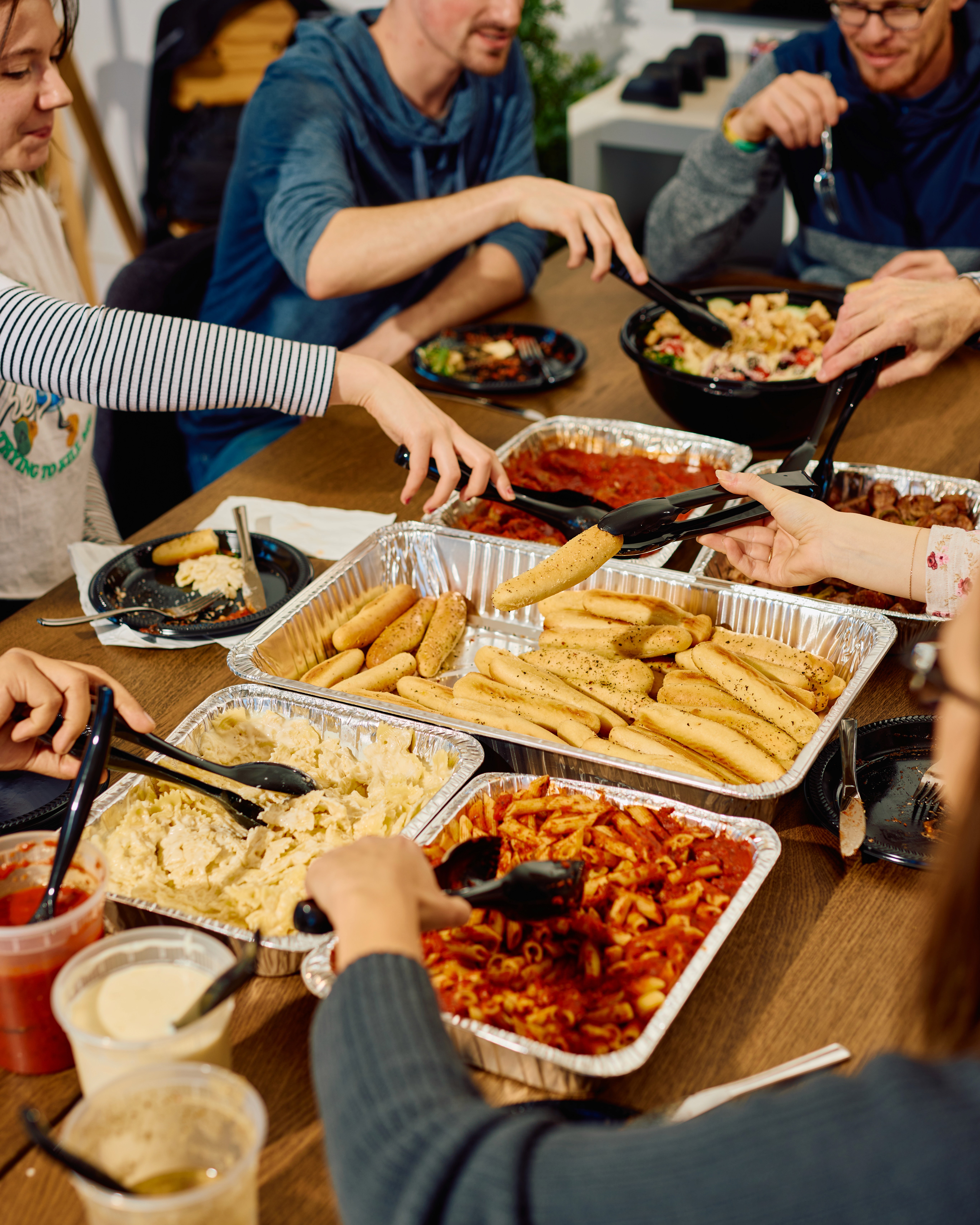 breadsticks, meatballs and salad from degidios catering