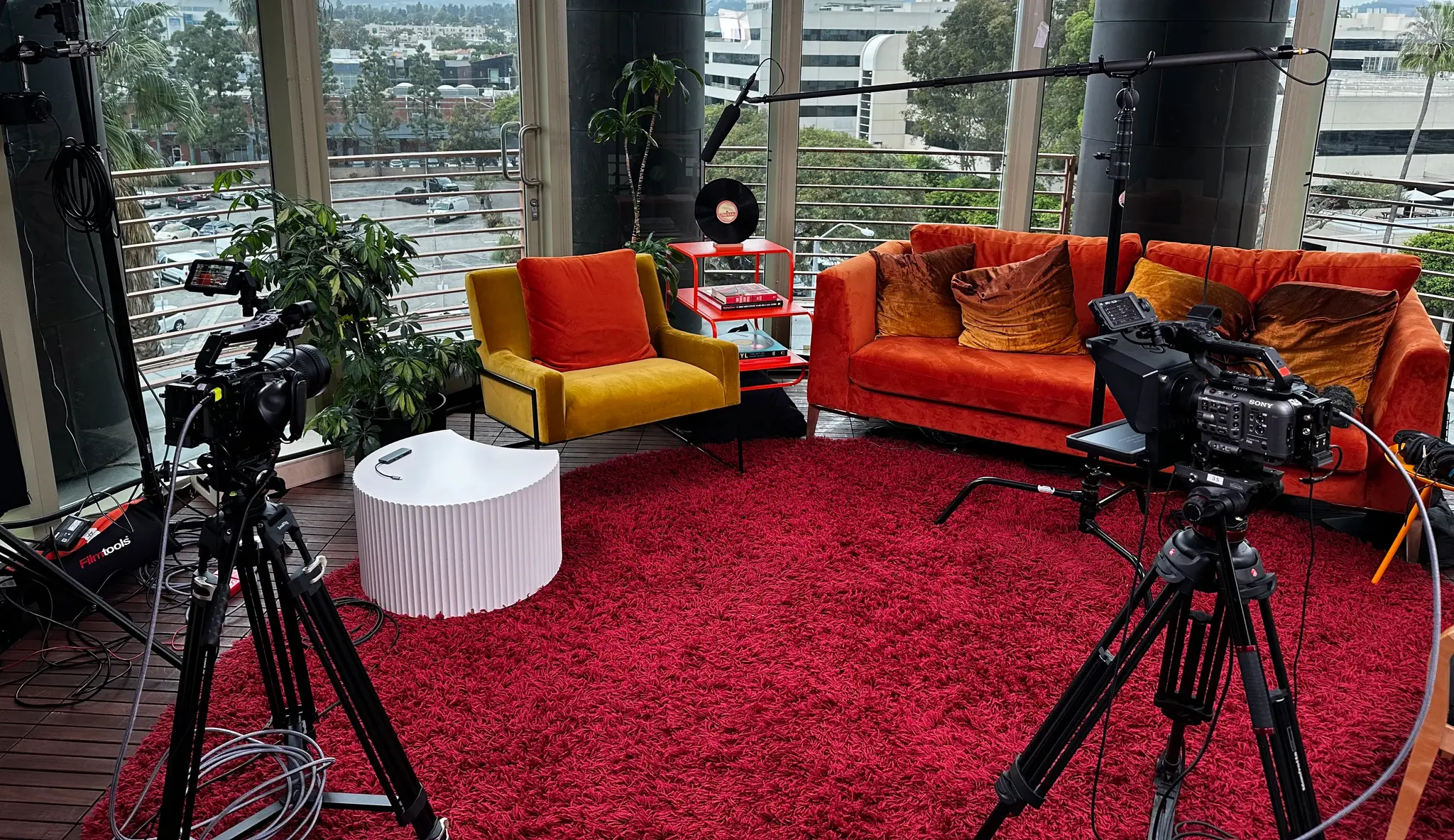 An interview set featuring two Sony FX6's, a shotgun mic, and a teleprompter