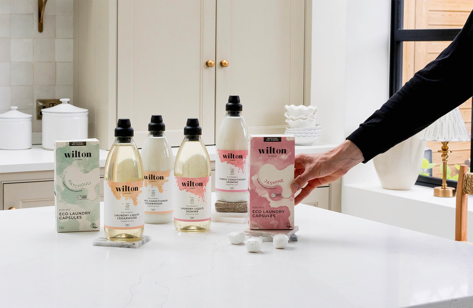 Streetside billboard with flyposters of the Batch.Works brand and illustrations