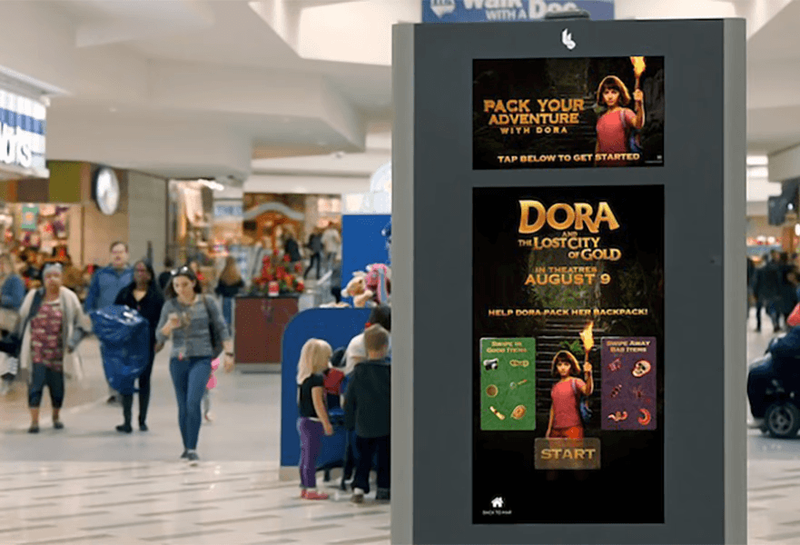 Photo of an interactive advert on a digital screen in a shopping mall