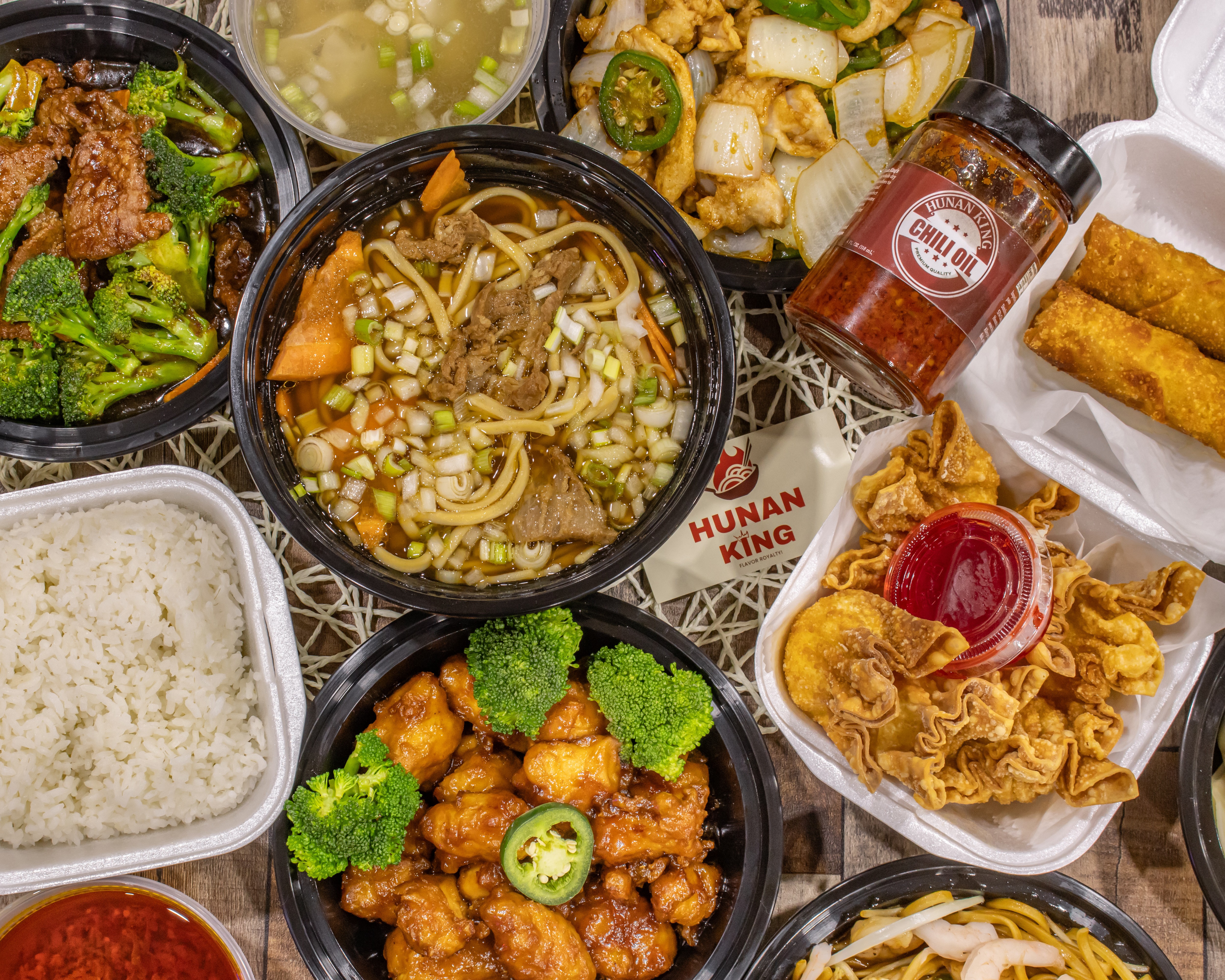 A close-up view of various baked goods on wooden plates, with warm, inviting colors and textures.