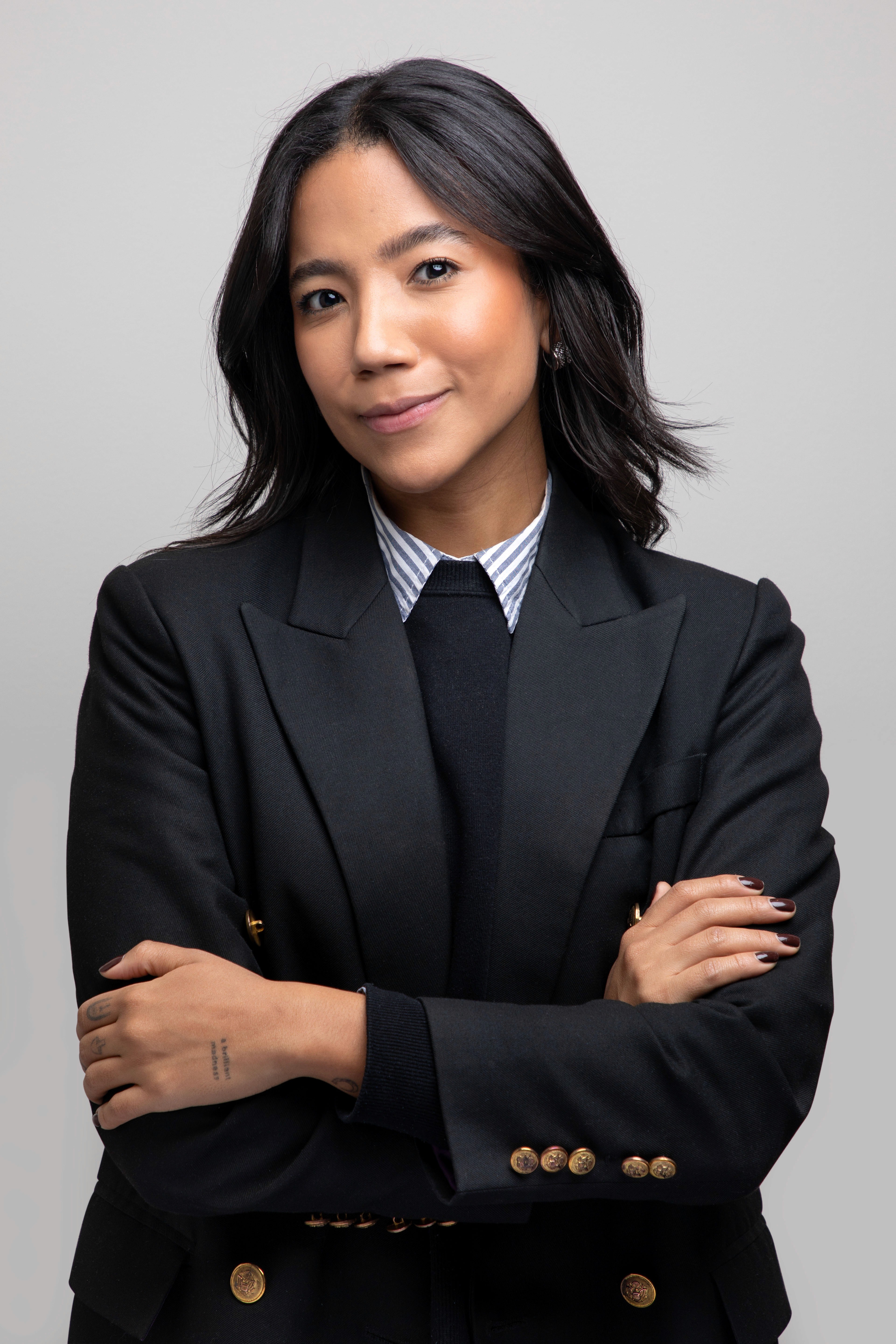 corporate woman folding arms