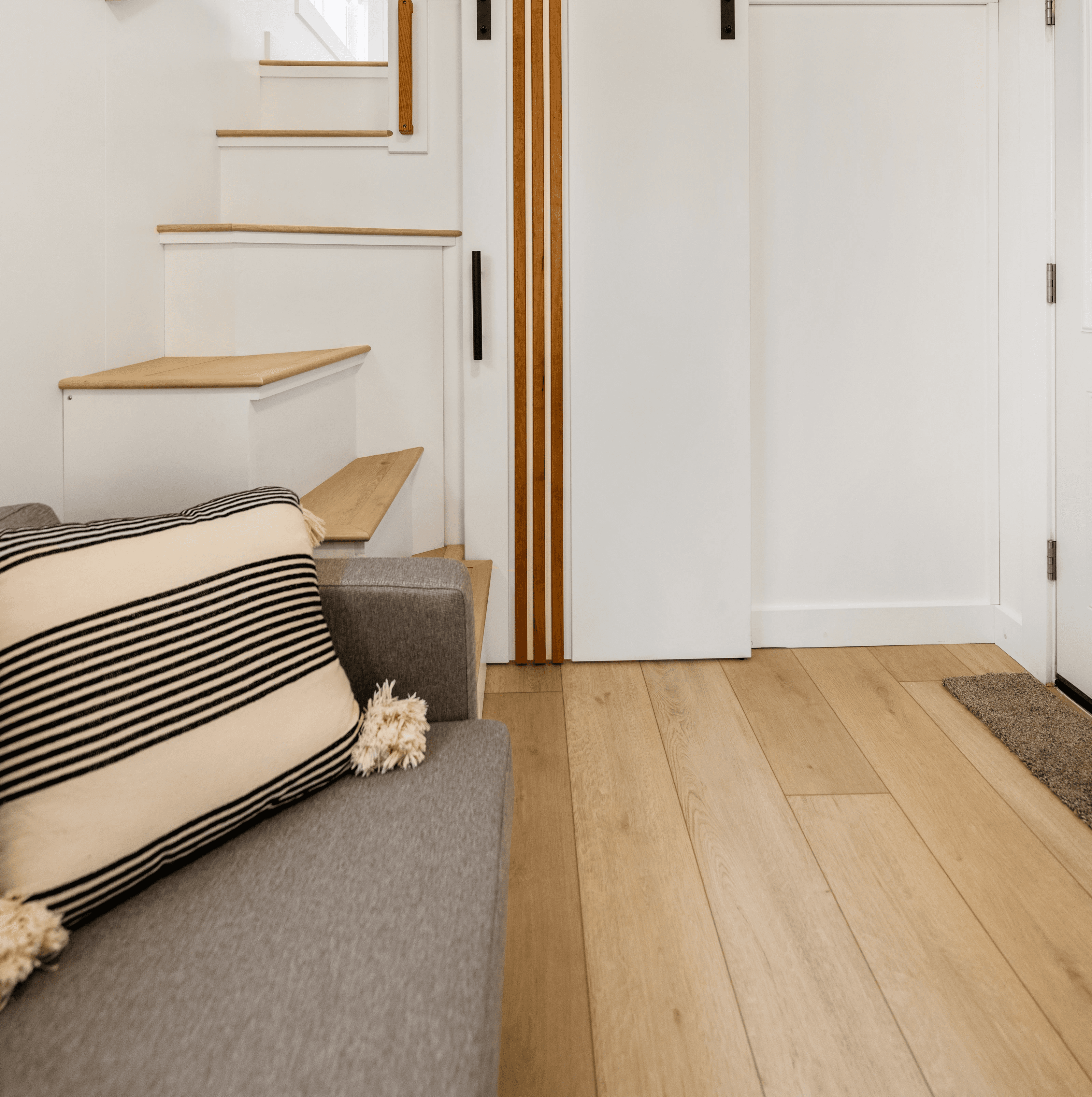 Detailed wood beam and wall accents in Southern Utah living room remodel by Madsen Homes