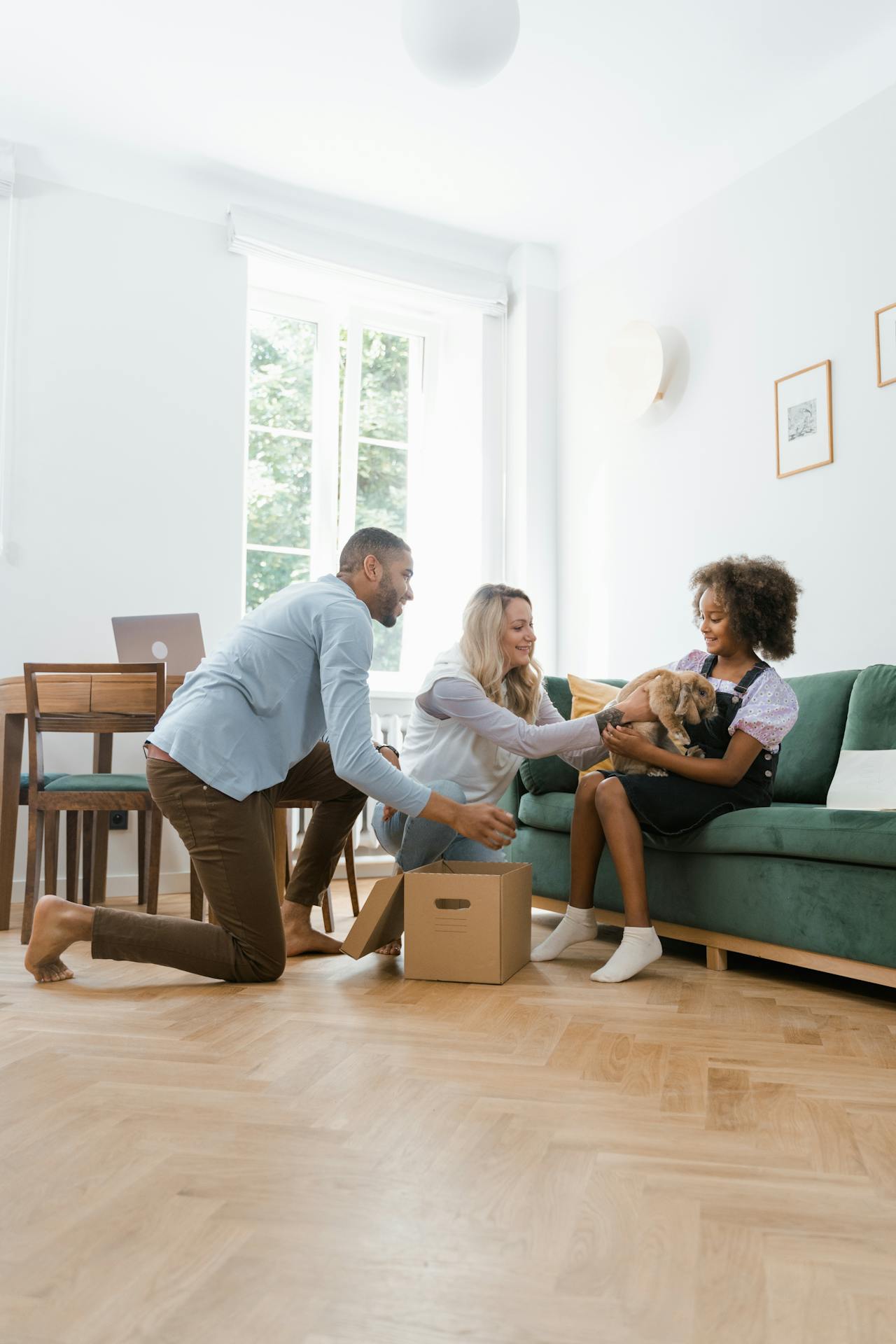 Friends Sitting Together in a Living Room Petting a Dog