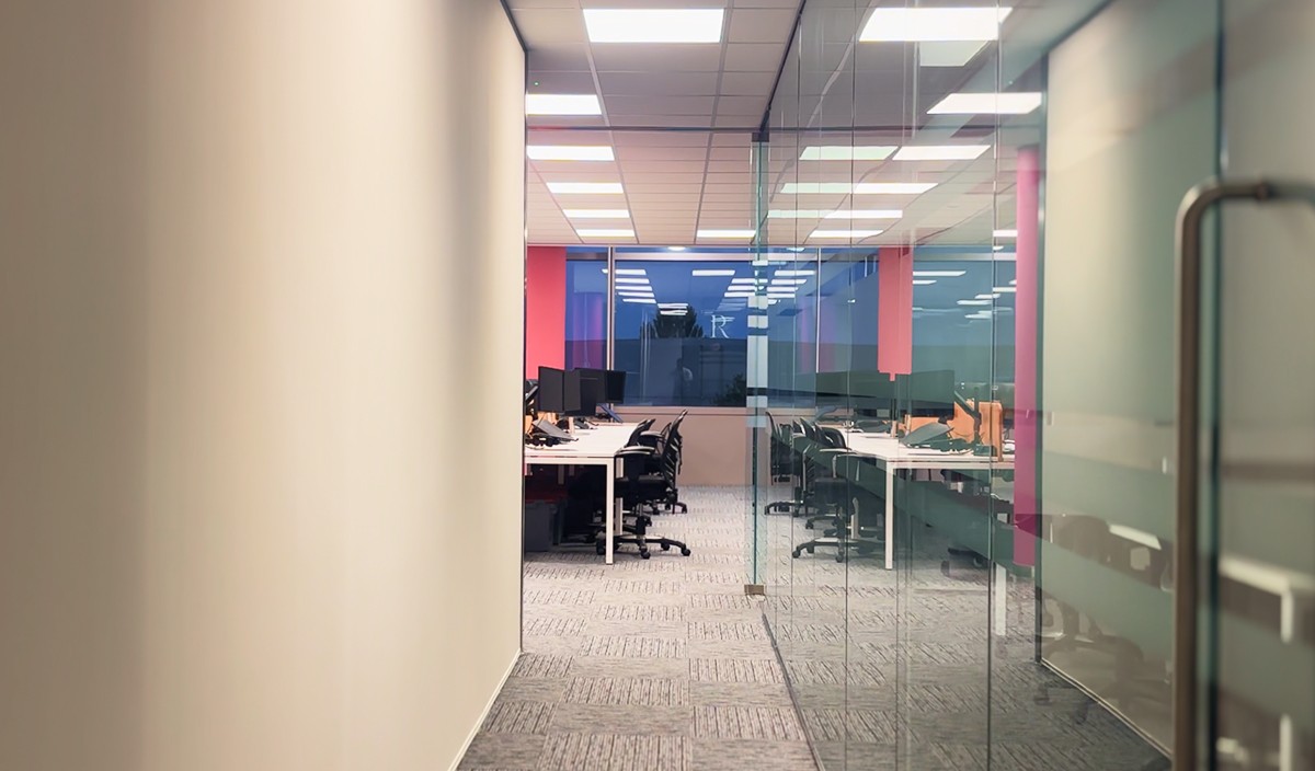 New office fit-out with glass panels providing natural lighting in the office space