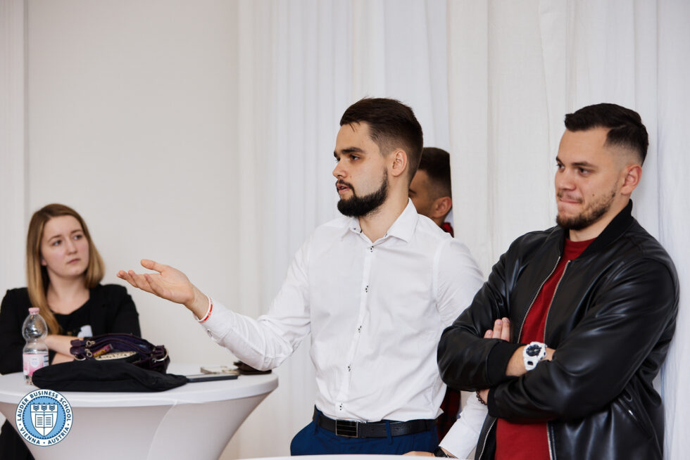 Students listening toMag. Berthold Baurek-Karlic, founder and managing director of Venionaire Capital