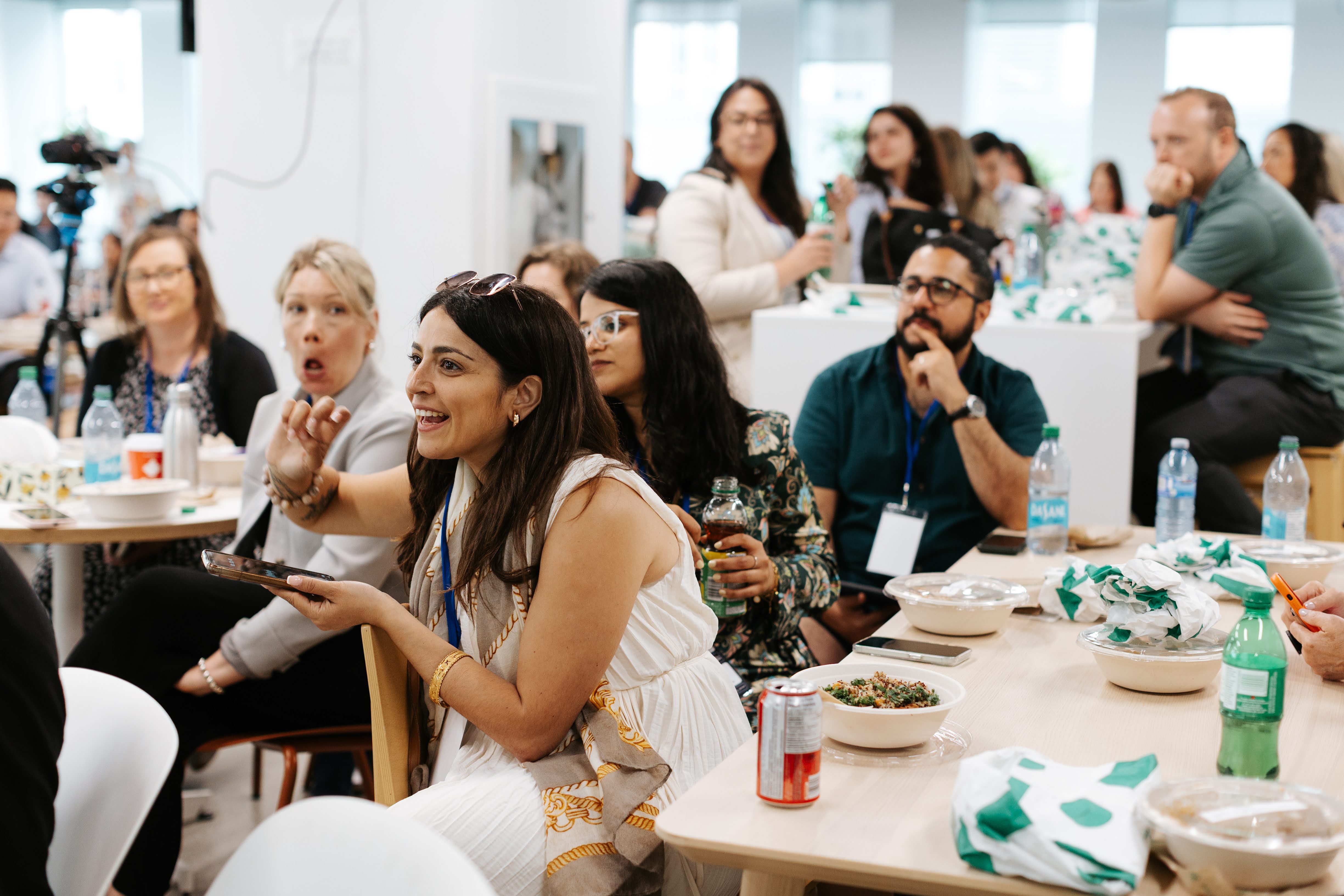 Photo Of People Sitting On Chairs