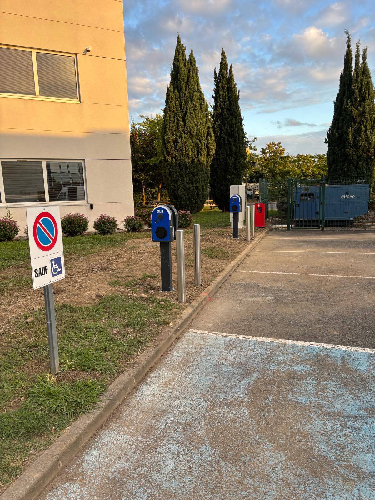 a man pumping gas into his car at a gas station